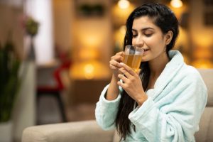 Girl is drinking green tea 